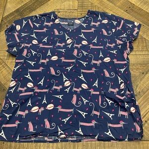 Zoe and Chloe navy blue scrub top with pink accents. Size XL